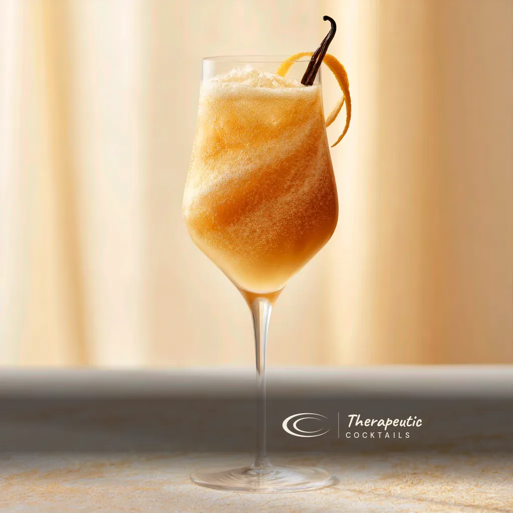 Vanilla coffee fizz — sparkling vanilla coffee over ice with a vanilla pod and orange twist